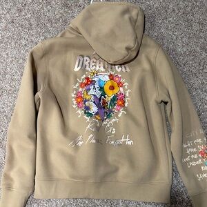 Tan Hooded Sweatshirt with Floral Skull Back Graphic